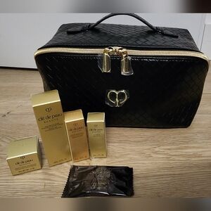 Cle de Peau Beaute Black Cosmetic Wide Leather Bag +5 Pcs Skin Care Travel Set